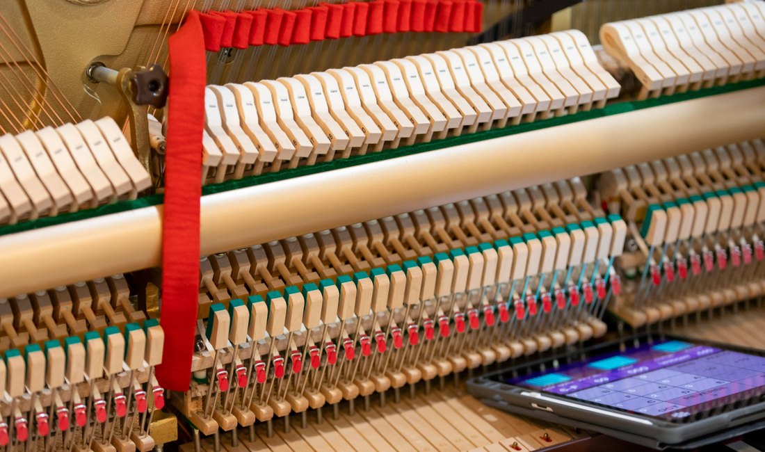 Interior of a Yamaha piano prepared under the Churairat Reconditioning Standard